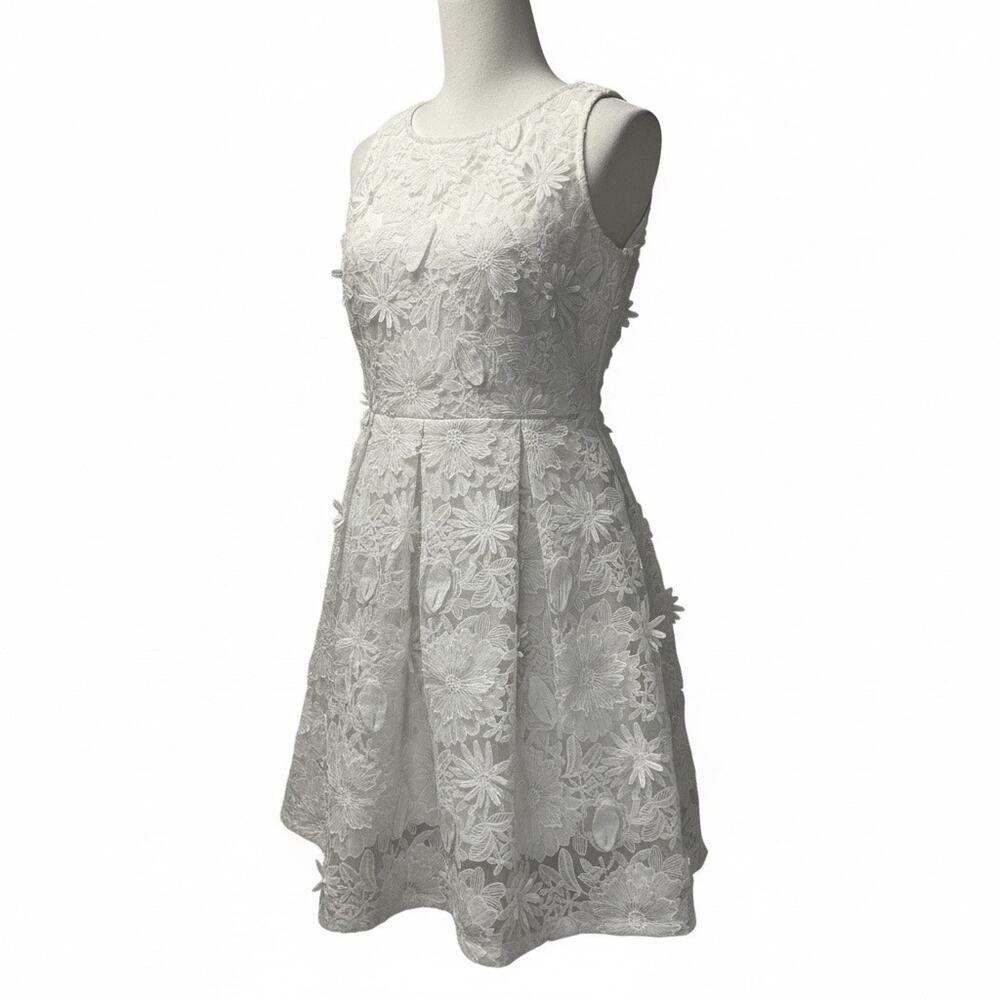 the clothing company White Floral Lace Mini Dress